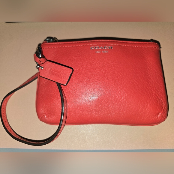 Coach Handbags - Coach Red Wristlet.